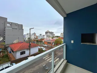 Vista da propriedade em Lajeado, Brasil, mostrando uma rua residencial e telhados.