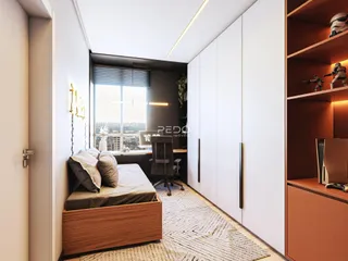 Quarto moderno com janela e armário em um apartamento.
