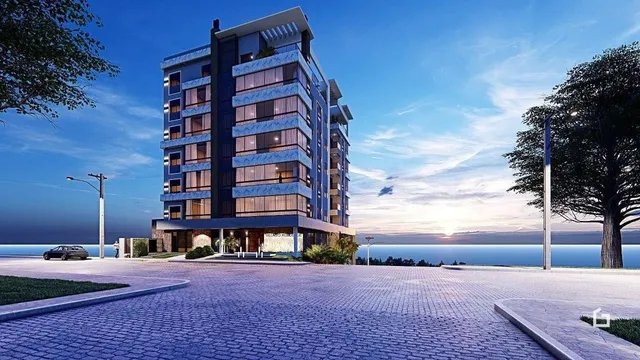Fachada de um edifício residencial moderno com vista para o oceano.