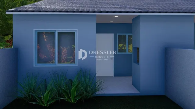 Fachada externa de uma residência azul em Lajeado, Brasil.