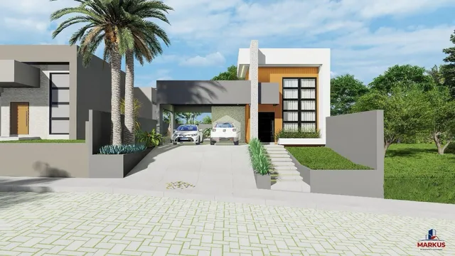 Fachada moderna de uma residência em Lajeado, Brasil, com paisagismo frontal.