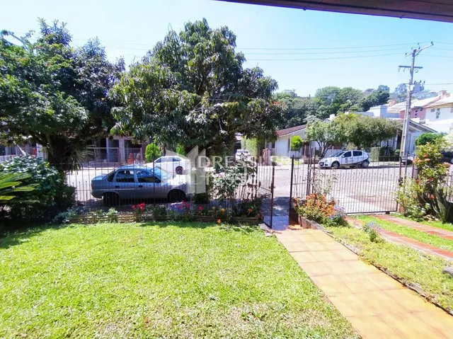 Vista externa de um terreno com gramado e cerca em Lajeado, Brasil.