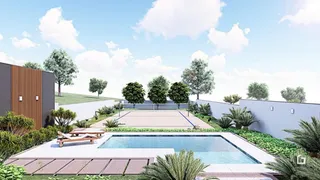 Vista de uma área de piscina e jardim em uma propriedade residencial.