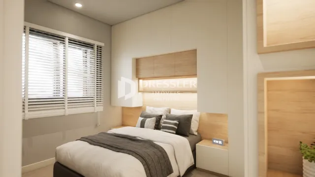 Quarto com cama e janela em um imóvel.