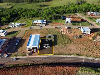 Vista aérea do lote 48 em Lajeado, Brasil, mostrando a área de terreno e construções adjacentes.