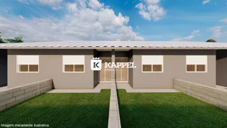 Fachada externa de uma casa residencial em Lajeado, Brasil, com jardim frontal.