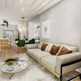 Sala de estar clara com sofá e piso claro em ambiente bem iluminado.