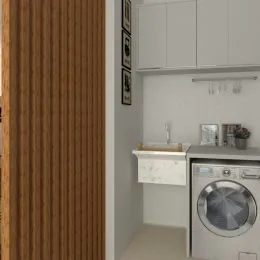 Foto de um interior de cozinha com armários brancos.