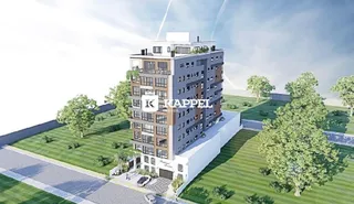 Fachada de um edifício residencial moderno com áreas verdes em Lajeado.