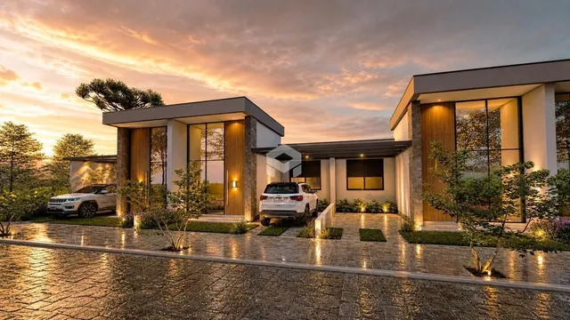 Fachada moderna de uma residência em Lajeado, Brasil, com paisagismo.