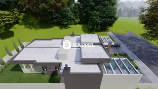 Vista externa de uma residência com telhado e jardim em Lajeado.