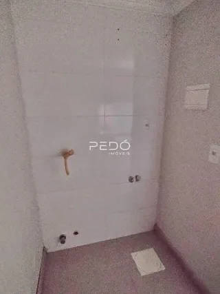 Hall de corredor interno de um imóvel em Lajeado.
