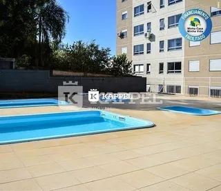 Foto de uma piscina externa em uma propriedade em Lajeado, Brasil.