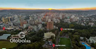 Vista aérea de uma área urbana em Lajeado, Brasil, mostrando edifícios e áreas verdes.