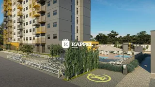 Vista externa de um edifício residencial moderno com área de piscina e paisagismo em Lajeado.