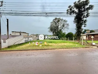 Vista externa de uma propriedade com gramado e cerca em Lajeado, Brasil.