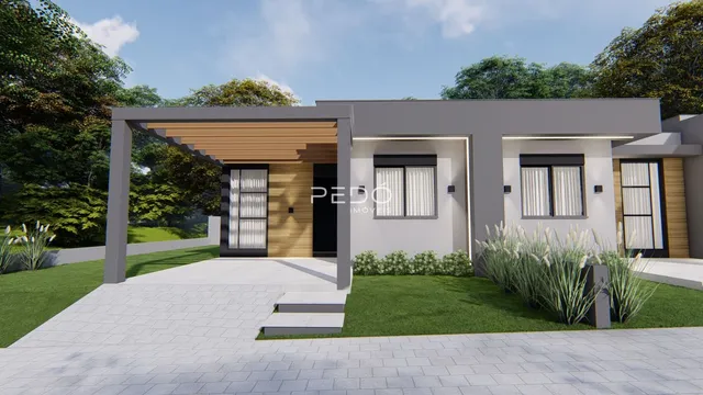Fachada moderna de uma casa em Lajeado, Brasil, com jardim frontal.