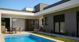 Fachada de uma casa moderna com piscina e área externa.