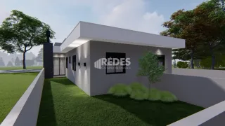 Fachada de uma residência moderna com jardim em Lajeado.