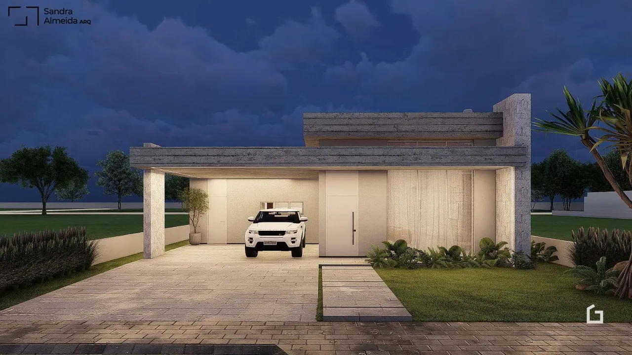 Vista externa de uma residência moderna em Lajeado, Brasil, com garagem e paisagismo.