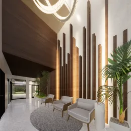 Interior de um ambiente com colunas verticais altas e piso claro.