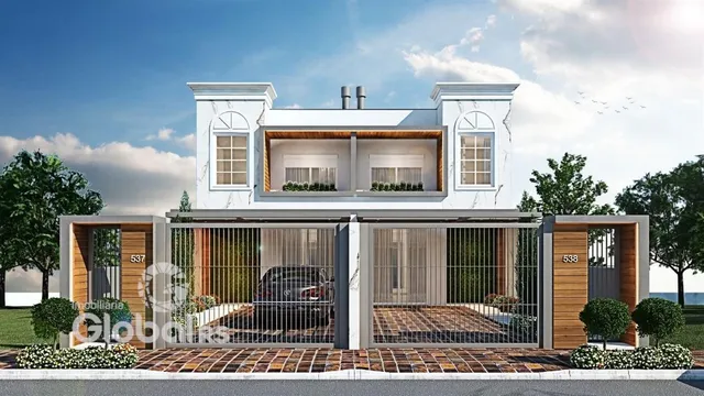 Fachada moderna de uma casa em Lajeado, Brasil, com jardim frontal.