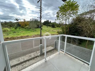 Foto de uma varanda com piso e grade de segurança em Lajeado.
