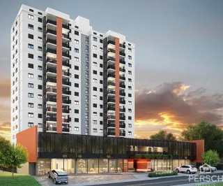Fachada de um prédio residencial moderno em Lajeado, Brasil, capturada ao pôr do sol.