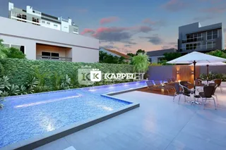 Foto de uma piscina externa com deck e área de lazer.