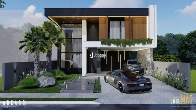 Fachada moderna de uma residência em Lajeado, Brasil com paisagismo.