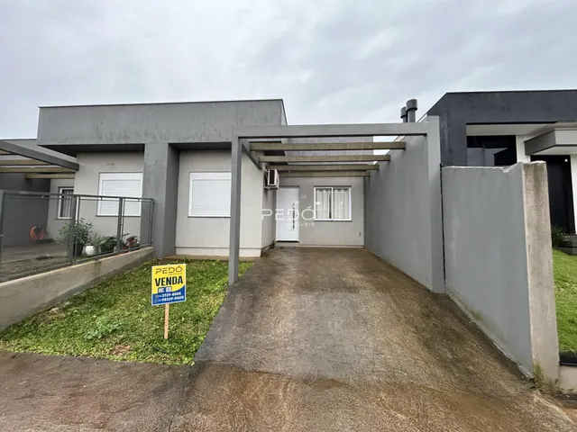 Vista externa de uma residência em Lajeado, Brasil, mostrando a fachada e a entrada.