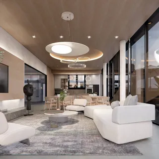 Sala de estar moderna com grandes janelas em um imóvel no Brasil.