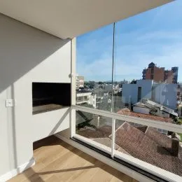 Vista da janela mostrando a paisagem urbana de Lajeado.