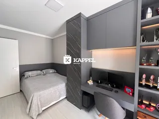 Quarto moderno com cama e armário em tons de cinza.
