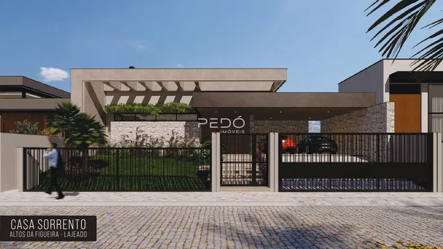 Fachada de uma residência moderna com portão e jardim em Lajeado.