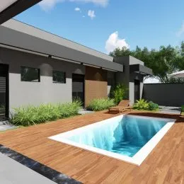 Foto de uma piscina externa com deck de madeira em uma residência.