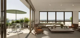 Sala de estar moderna com grandes janelas e vista para a paisagem.