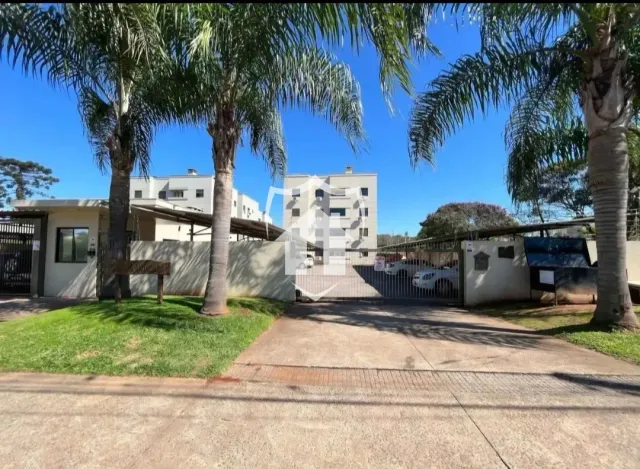 Vista externa de uma propriedade com árvores e cerca em Lajeado.