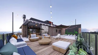 Vista externa de uma residência com deck e mobiliário ao ar livre.