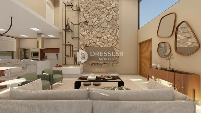 Sala de estar moderna com parede de pedra e móveis de design.