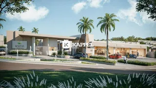 Fachada de um complexo residencial com paisagismo e palmeiras em Lajeado.