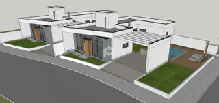 Vista externa de uma residência em Lajeado, Brasil, mostrando a arquitetura e o paisagismo.