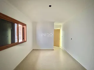 Corredor interno de um imóvel em Lajeado, Brasil.