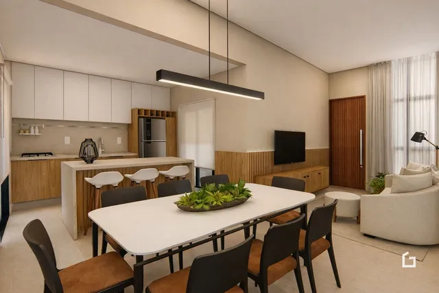 Imagem de uma sala de jantar moderna com cozinha integrada.