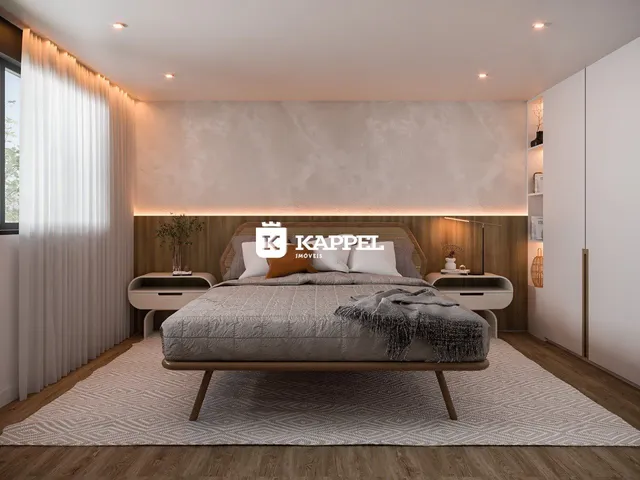Quarto moderno com cama grande e iluminação ambiente.
