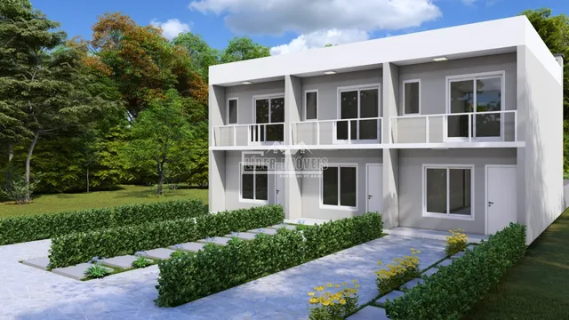 Fachada de uma casa moderna com dois andares em Lajeado, Brasil, com jardim frontal.