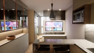 Sala de estar moderna com decoração contemporânea e móveis planejados.