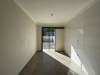Corredor interno de uma residência em Lajeado, Brasil.