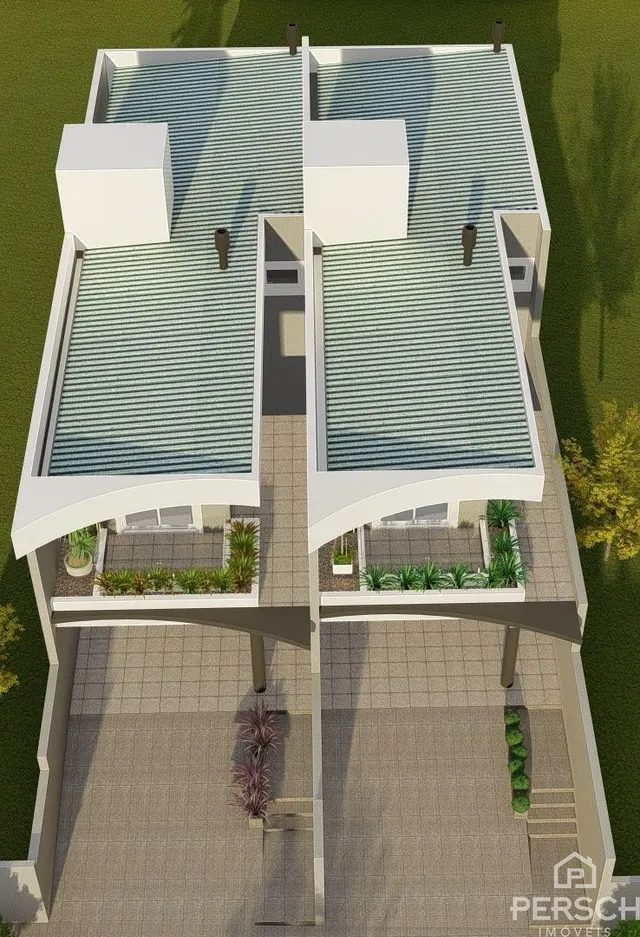 Fachada de uma casa residencial em Lajeado, Brasil, mostrando o telhado e as áreas externas.