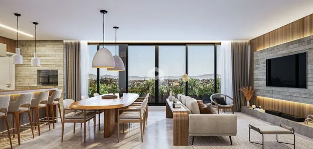 Ambiente moderno com grande porta de vidro e vista externa.